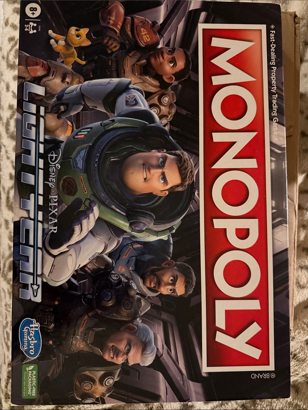 Hasbro Monopoly Lightyear Board Game with Red and Green Artwork